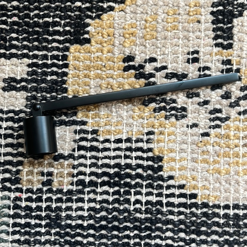 Black candle snuffer